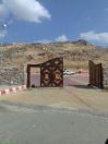 بلدية المجاردة تنتهي من بناء جدار حجري لمدخل عين ثربان الحارة